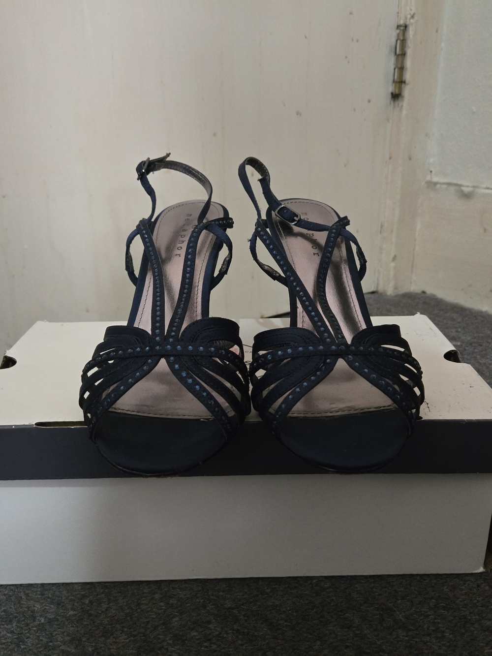 Metaphor navy blue strappy sandals featuring rhinestone embellishments